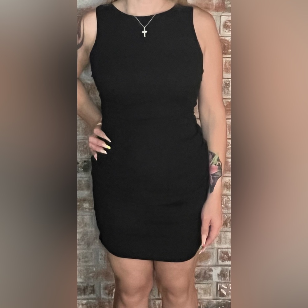 Elegant Sleeveless & Textured Peekaboo Back Black Dress